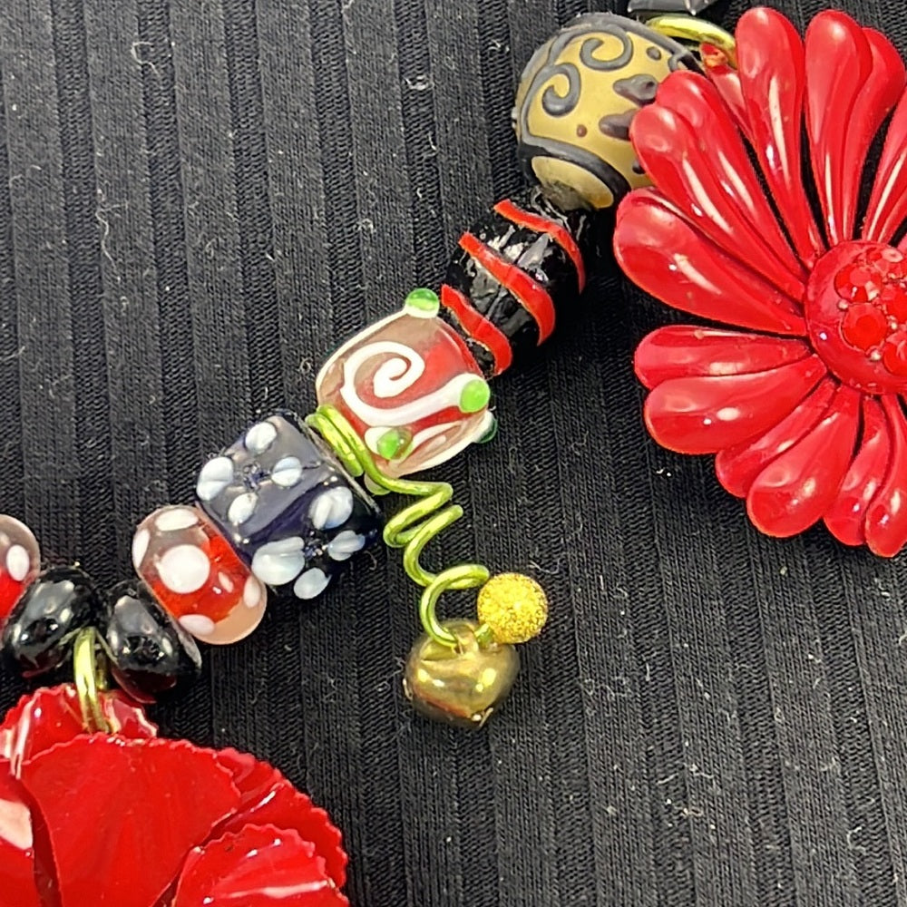 Adorned Crown Artisan Assemblage jingle bell poinsettia Christmas necklace