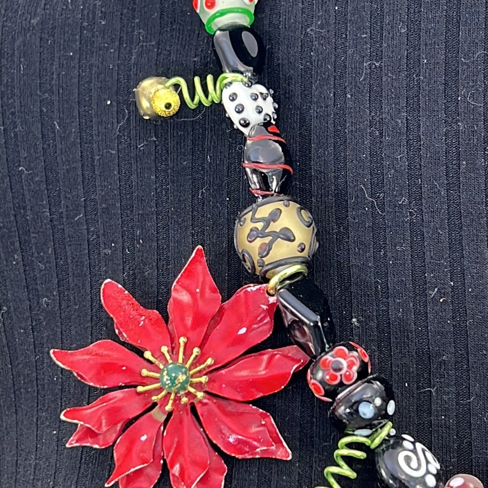 Adorned Crown Artisan Assemblage jingle bell poinsettia Christmas necklace