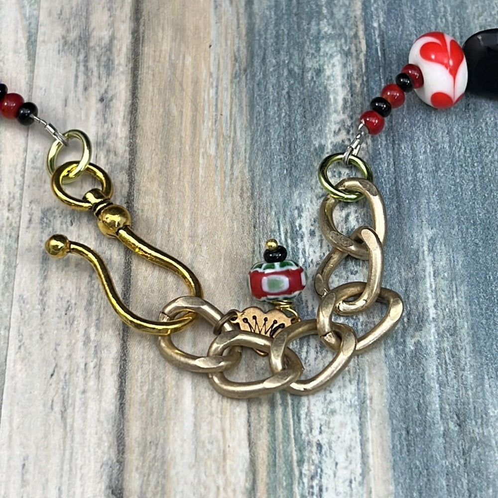 Adorned Crown Artisan Assemblage jingle bell poinsettia Christmas necklace