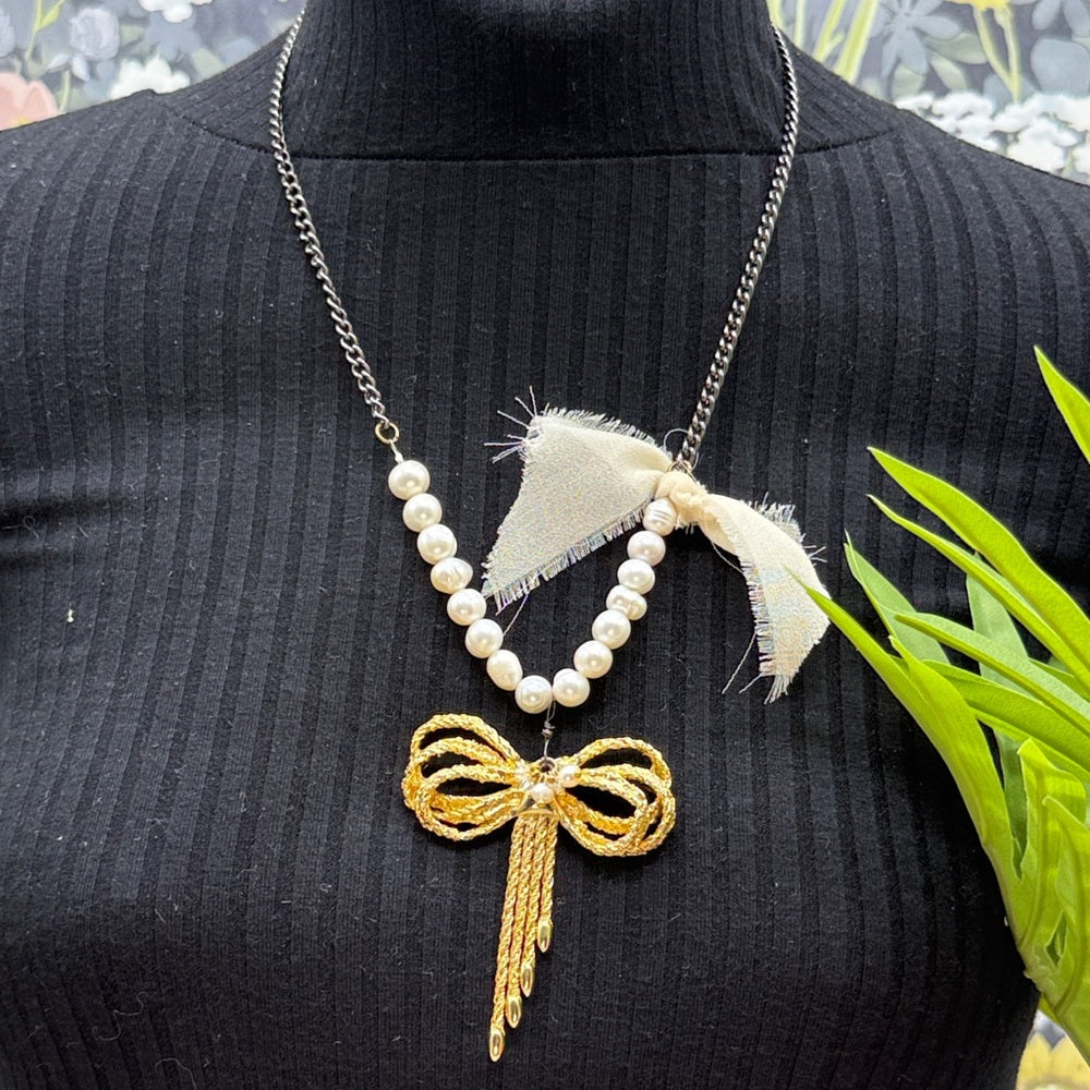 Adorned Crown Jewelry assemblage pearl gold bow necklace