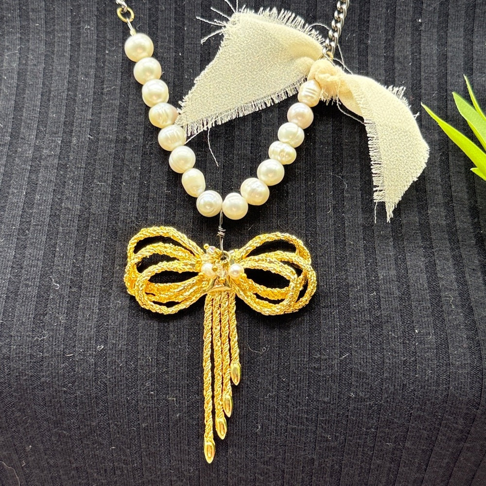 Adorned Crown Jewelry assemblage pearl gold bow necklace