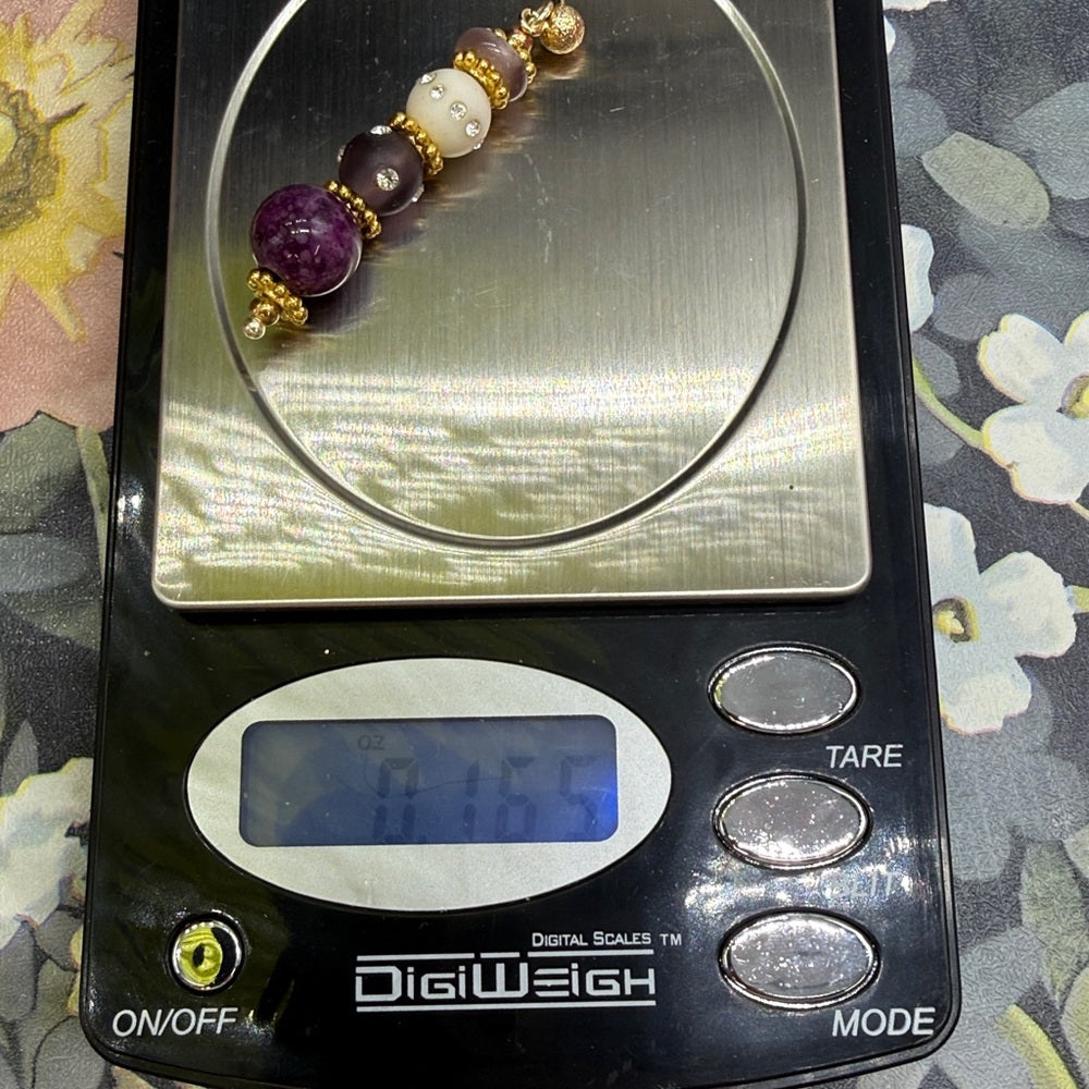 Adorned Crown Jewelry assemblage purple asymmetrical stone post earrings