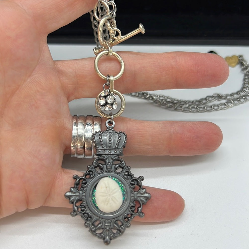 Adorned Crown Assemblage beaches & butterflies sand dollar crown necklace