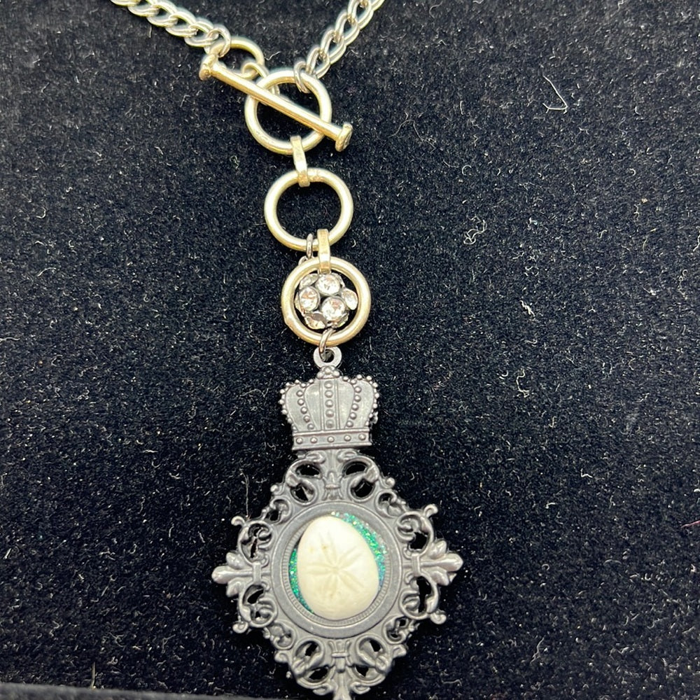 Adorned Crown Assemblage beaches & butterflies sand dollar crown necklace