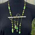 Adorned Crown Artisan Assemblage cloisonné bar green bead drop necklace